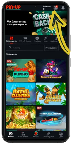 Pin Up-da həftəlik 10% cashback banneri və kazino lobisindəki slot oyunlarının kataloqu
